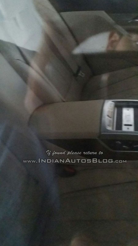 2016-BMW-7-Series-rear-armrest-India-spied-576x1024.jpg