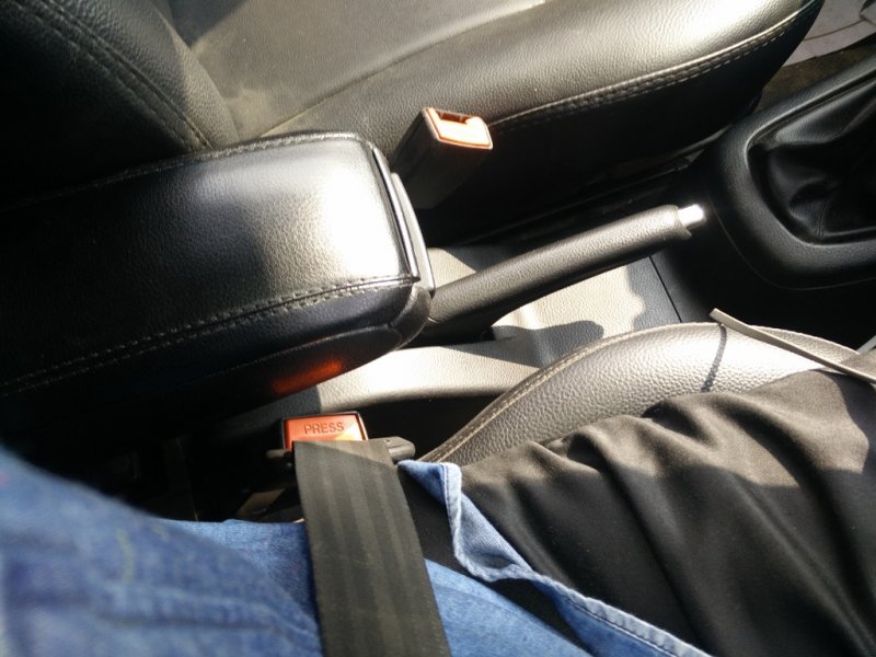 19. Seat belt buckle gap from armrest.jpg