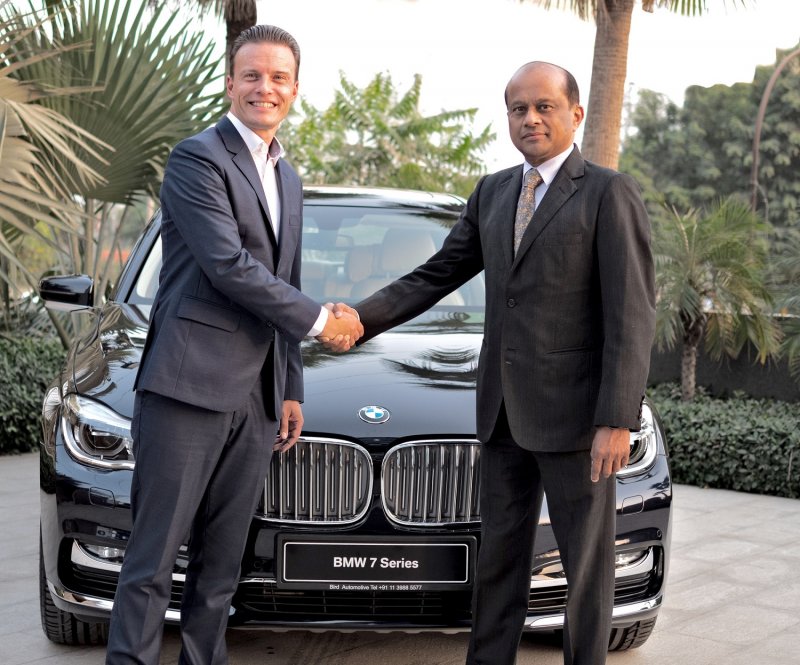 01 Image (L-R) Mr. Rene Gerhard, Director, Sales, BMW India with Mr. Sun....jpg