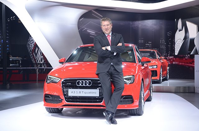 Mr_ Joe King, Head, Audi India with Audi A3 Sedan at Auto Expo 2014.jpg