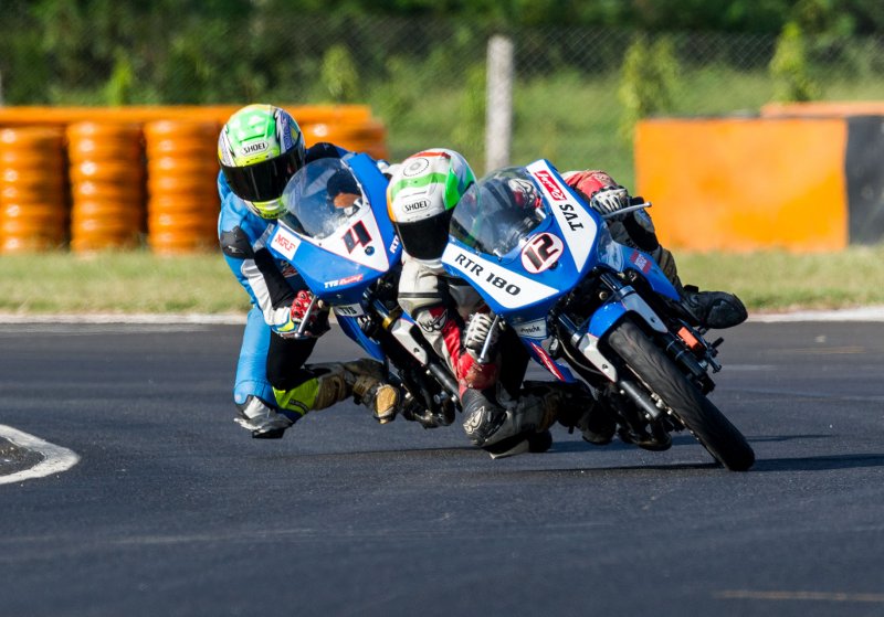 Kannan Subramaniam (No.12), winner of both races in the Super Sport Indian 165cc class (Oct 09).jpg