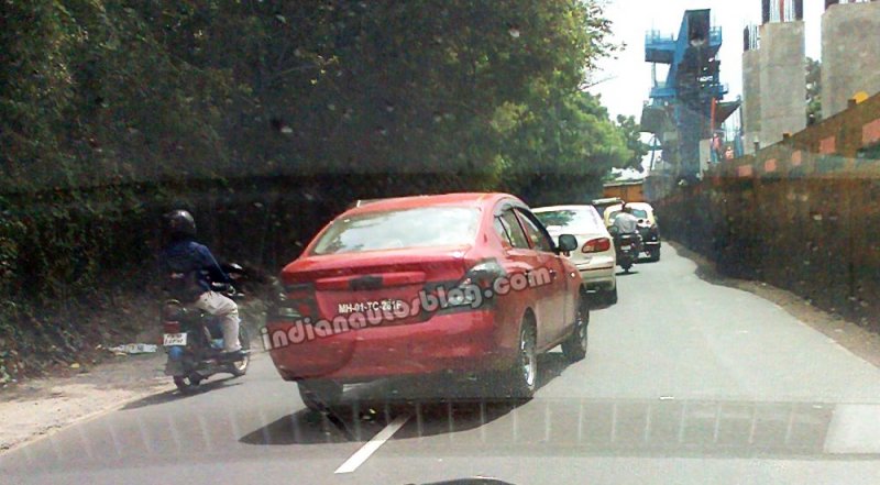 Nissan-Sunny-maroon-side.jpg