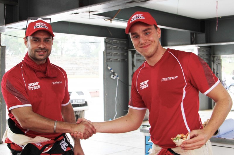 Gaurav Gill (left) congratulates Ole Christian Veiby (Aug 13).JPG