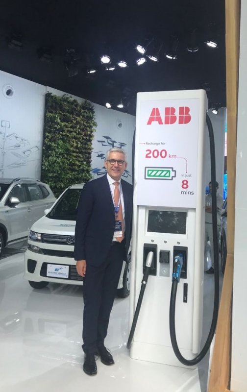 Ulrich Spiesshofer, CEO of ABB with ABB fast-charger (just eight minutes....jpg