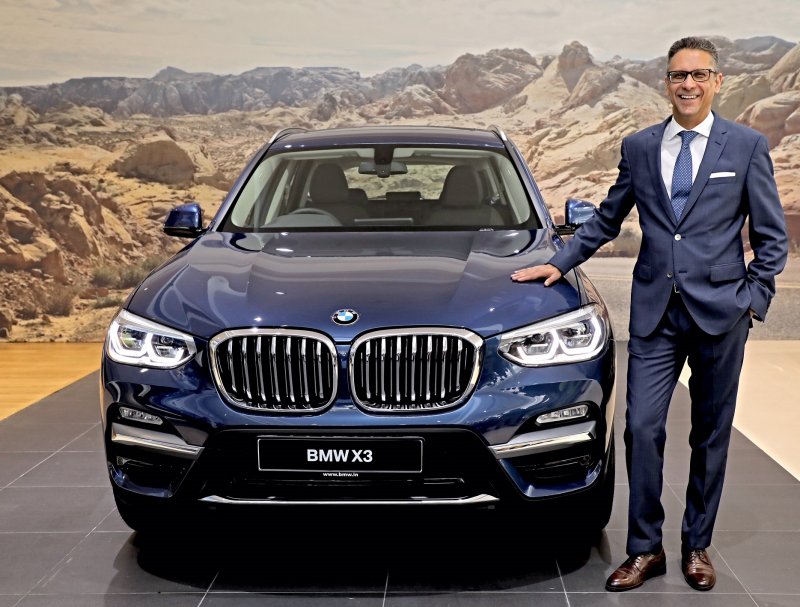 Mr. Vikram Pawah, Chairman, BMW Group India with the all-new BMW X3.JPG