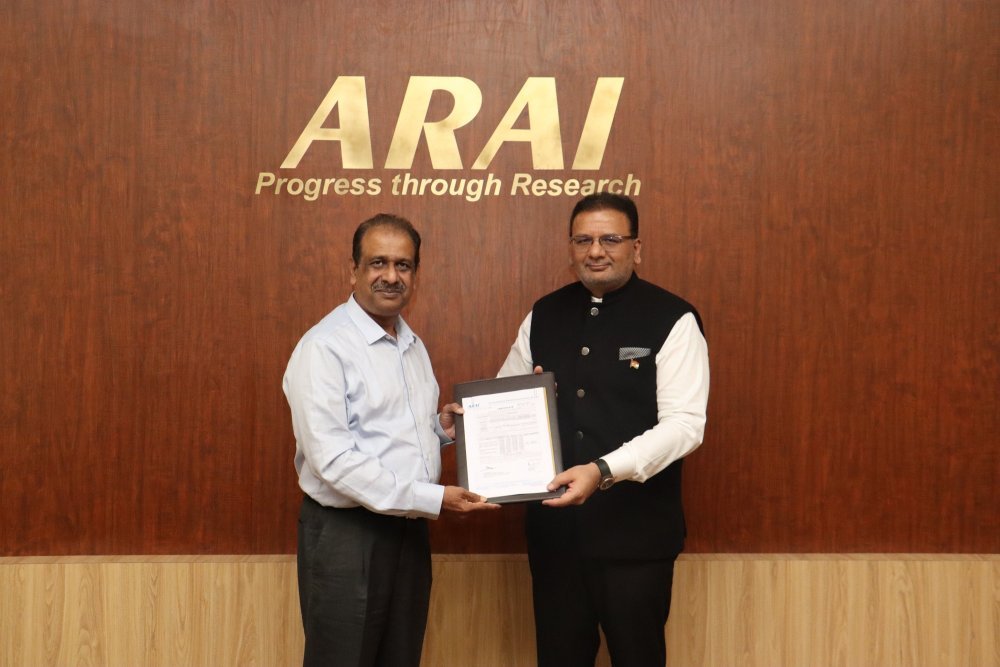 Dr. Reji Mathai, Director, ARAI presenting the CMVR certificate to Dr. Sudhir Mehta, Founder &...JPG