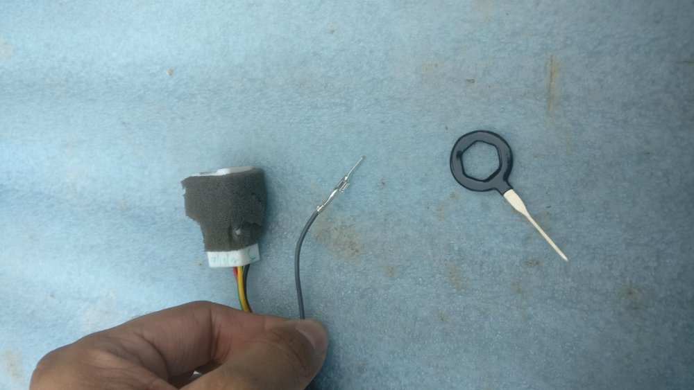 10. OE Wire de-pin from connector to connect the new wires.jpg