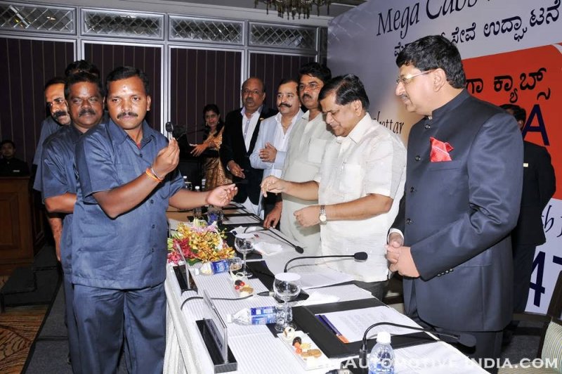 Handover of 1st Mega Cab key to the driver at Mega Cabs Bengaluru launch event..JPG