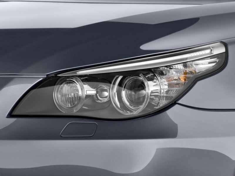 bmw_5_series_535i_xdrive_sports_wagon_2010_exterior_headlight.jpg